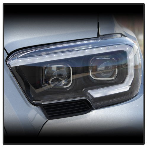 xTune Toyota Tacoma 16-18 DRL Light Bar Projector Headlights - Black PRO-JH-TTA1